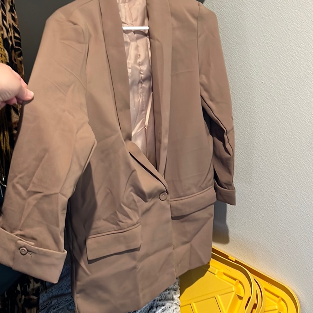 Women’s brand new  single button blazer.
